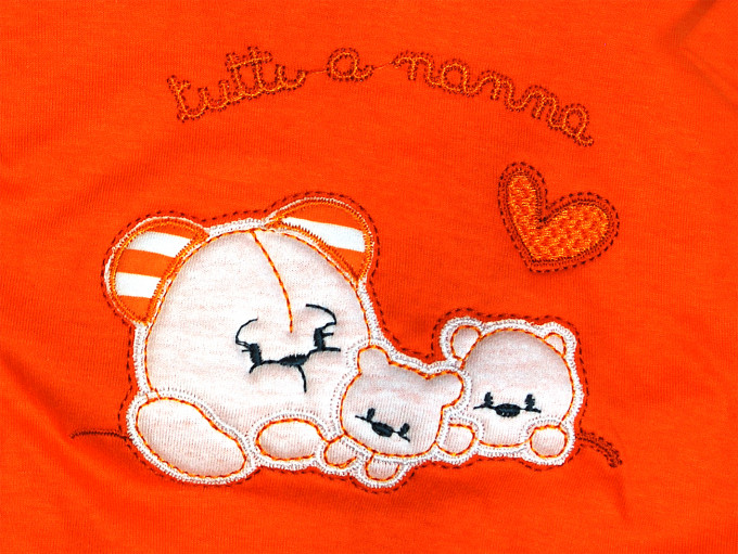 cotton baby footie all at bedtime. Colour orange, size first days 2