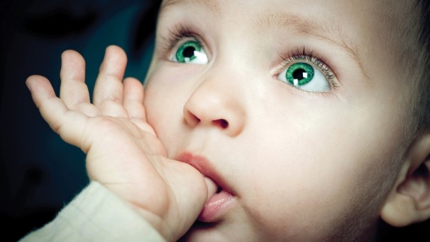 Why do babies put their fingers in their mouths?